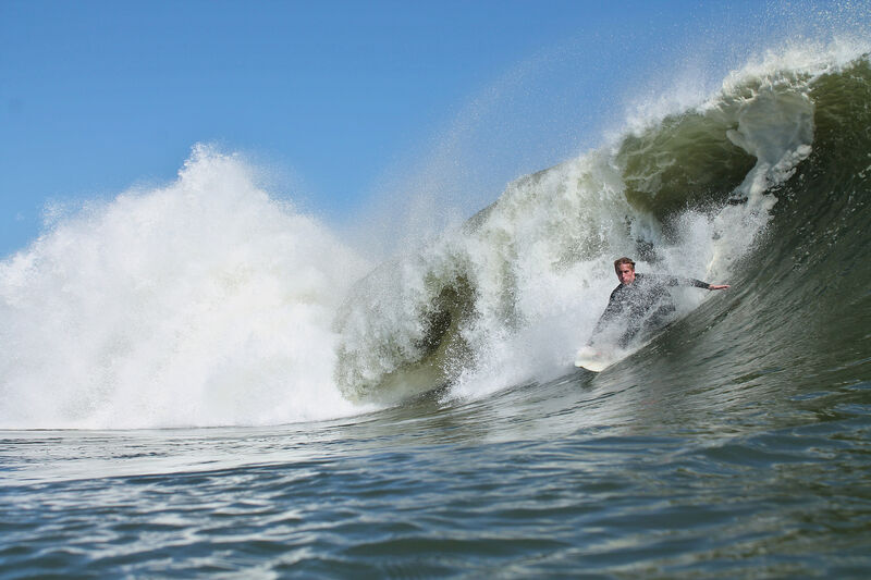 Surfer in wave, Skeleton Coast